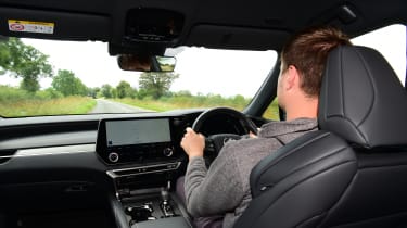 Auto Express staff writer Alastair Crooks driving the Lexus RX 500h